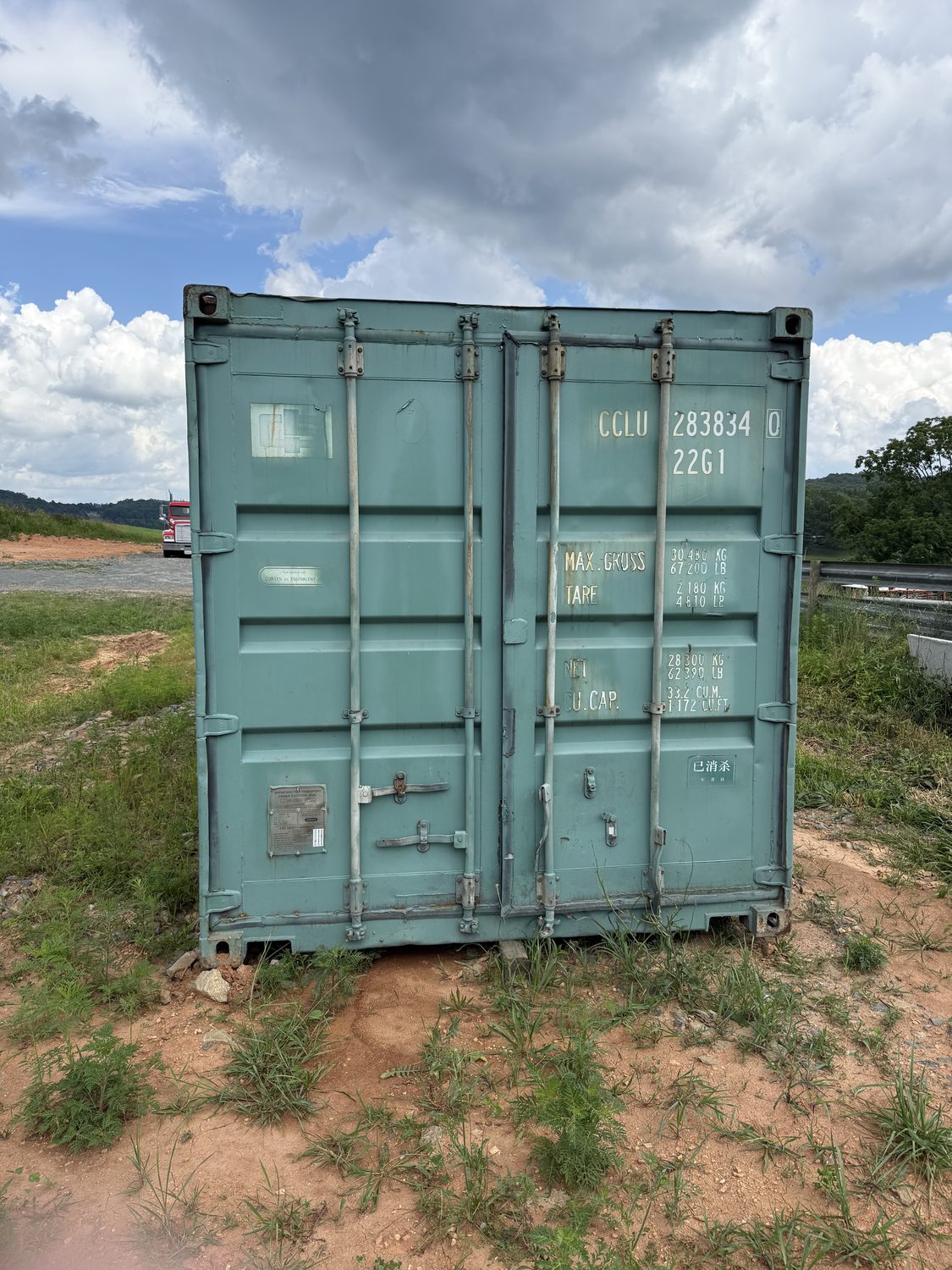 Shipping container used for farm and agriculture storage on rural property
